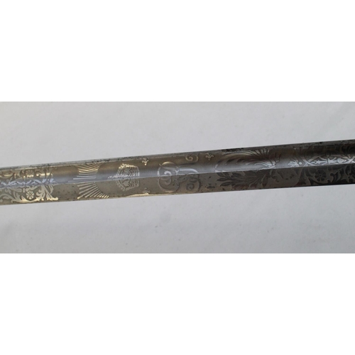 181 - 1912 Cavalry Officers sword by Fenton Brothers of Sheffield. Blade is etched with scrolls and arabes... 