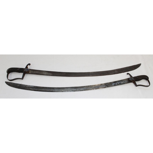 251 - Two 1796 light cavalry troopers swords, lacking scabbards with age related wear to handle wire and l... 