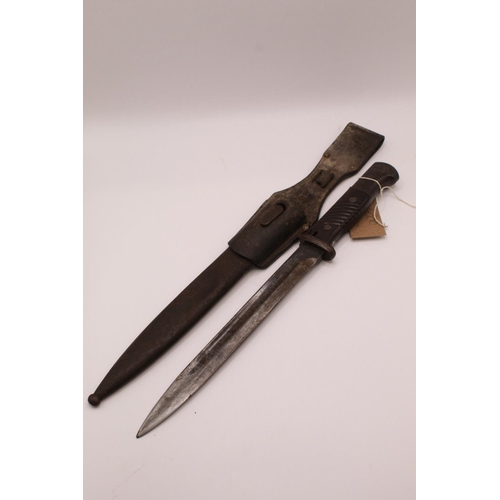 282 - WWII German K98 Mauser bayonet, with original scabbard and leather frog, with serial no. 7350. Blade... 