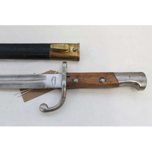 291 - Brazilian M1908 bayonet, complete with leather scabbard with brass mounts, manufactured by Alex Copp... 