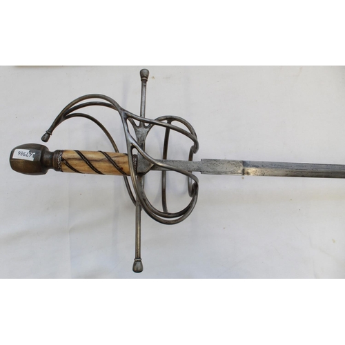 258 - Quality copy of a C17th style rapier. Bone handle and heavy steel pommel with large steel basket and... 