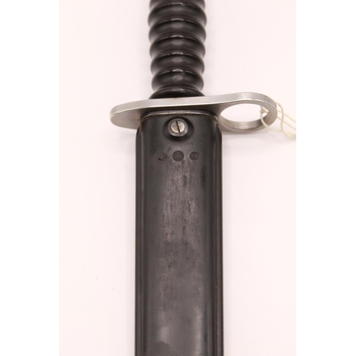 312 - Swiss M1957 bayonet, complete with original plastic scabbard. Victorinox 'V' above serial no. and th... 