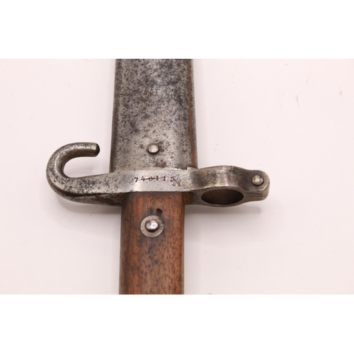 314 - Austrian M1885 NCO bayonet complete with scabbard. With crossed out serial no. 74011 to guard and a ... 