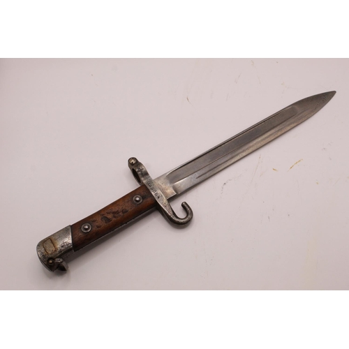 314 - Austrian M1885 NCO bayonet complete with scabbard. With crossed out serial no. 74011 to guard and a ... 