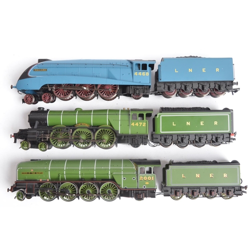 1073 - Three boxed OO gauge electric steam train models from Hornby, all LNER and all with pre-fitted digit... 