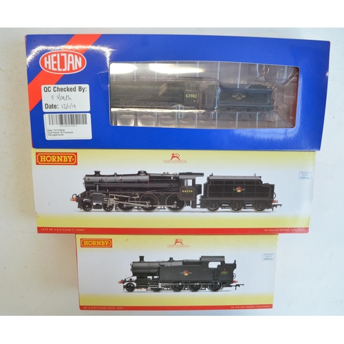 1081 - Three boxed OO gauge electric steam train models, all BR black liveried to include Hornby RR3223 2-8... 