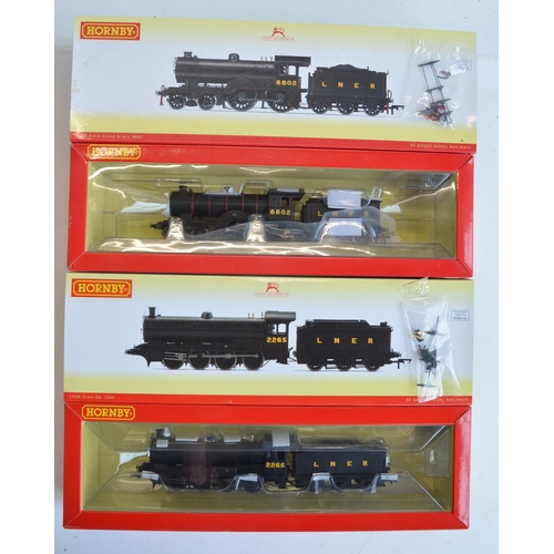 1082 - Three boxed OO gauge electric steam train models, all in LNER black liveries to include Hornby R3521... 