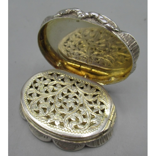 1063 - Victorian silver vinaigrette in oval form with bands of engine turned pattern, monogrammed cartouche... 