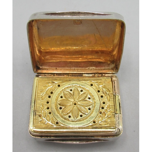 1064 - George III silver vinaigrette in rectangular form, plain exterior with gilt interior, pierced and en... 