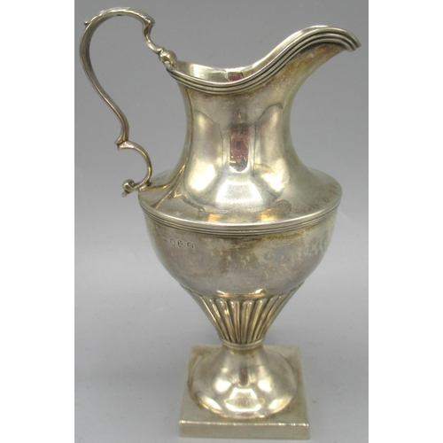 1057 - George III silver jug with square foot, part lobed urn style body and sweeping handle, London, 1805,... 