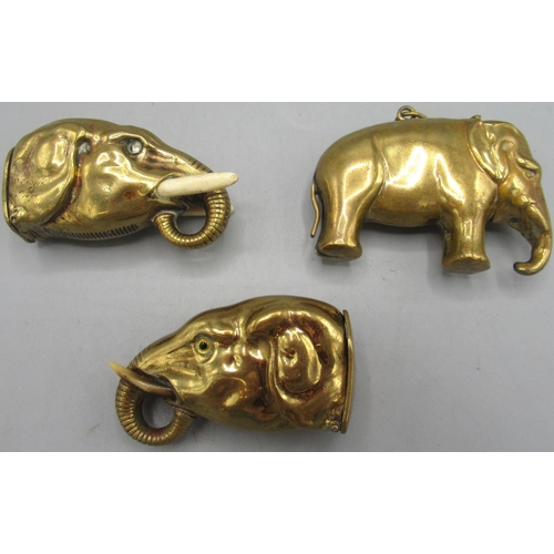 1120 - Early C20th brass elephant head vesta case with inset eyes and tusks made of horn, another elephant ... 