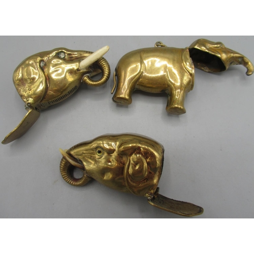 1120 - Early C20th brass elephant head vesta case with inset eyes and tusks made of horn, another elephant ... 