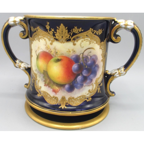 1195 - Large Royal Worcester two handled mug, painted in gilt scroll reserve panel with apples and grapes b... 