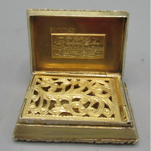 1042 - George IV silver gilt vinaigrette with a scrolling foliate repoussé lid, monogrammed cartouche, engi... 