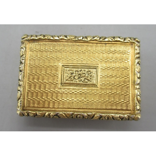 1042 - George IV silver gilt vinaigrette with a scrolling foliate repoussé lid, monogrammed cartouche, engi... 