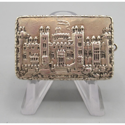 Early Victorian silver castle top vinaigrette, hinged lid decorated in high relief of Windsor castle, engine turned base, gilt interior with a pierced foliate scrolling grille by Nathaniel Mills, Birmingham, 1839, W4cm, 0.98ozt