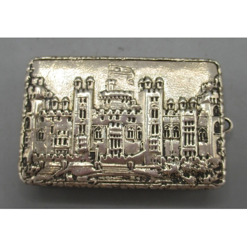 1035 - Early Victorian silver castle top vinaigrette, hinged lid decorated in high relief of Windsor castle... 