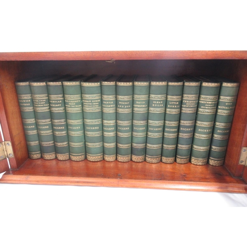 1271 - Dickens (Charles) 13 volume, green half-leather binding set, 5 raised bands and gilt work to spine, ... 