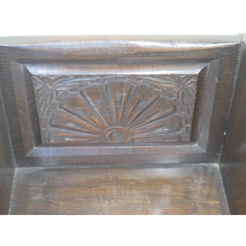 1444 - 17th century style small oak pew, with fan carved back and shaped seat, solid end supports carved wi... 