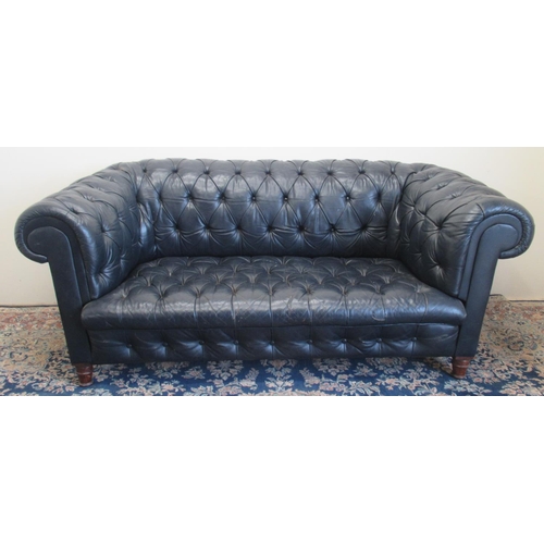 1420 - Victorian Chesterfield sofa, later reupholstered in buttoned blue leather, on turned supports, W190c... 