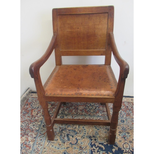 1369 - Robert Mouseman Thompson of Kilburn - a set of six (4 + 2) oak dining chairs, with adzed panel backs... 