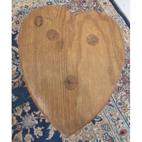 1398 - Alan Acornman Grainger, Acorn Industries Brandsby - an oak low stool, heart shaped seat on three fac... 