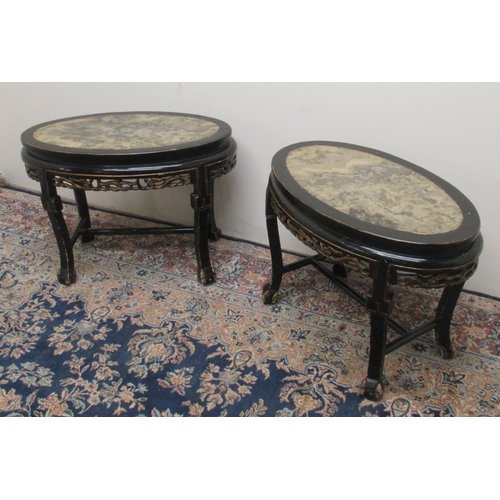 1432 - Pair of 19th century Chinese ebonised oval tables, with inset tops and pierced frieze with gilt deta... 