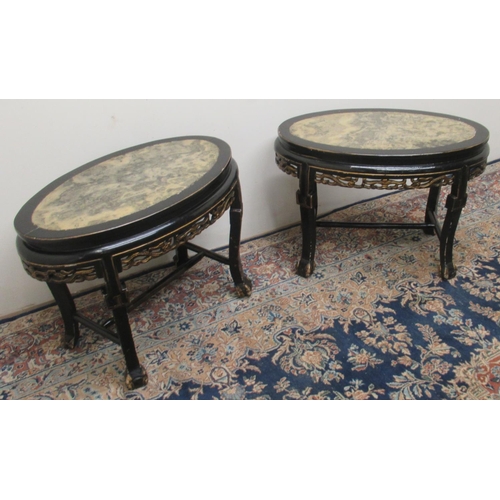 1432 - Pair of 19th century Chinese ebonised oval tables, with inset tops and pierced frieze with gilt deta... 