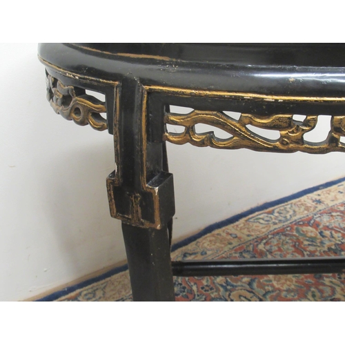 1432 - Pair of 19th century Chinese ebonised oval tables, with inset tops and pierced frieze with gilt deta... 