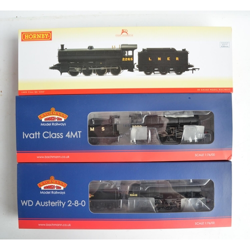 1083 - Three boxed OO gauge electric steam train models from Hornby, all black livery to include Bachmann 3... 