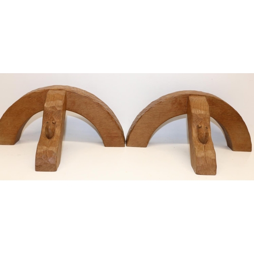 1379 - Robert Mouseman Thompson of Kilburn - a pair of demi-lune adzed oak wall lights, shaped support carv... 