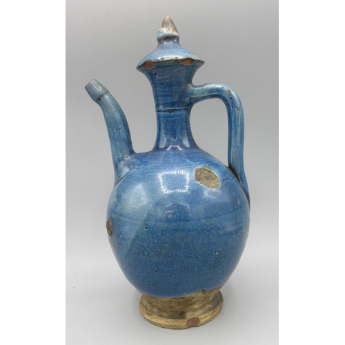 1164 - Turkish or Mesopotamian blue glazed pottery ewer, 17th/18th century H27cm