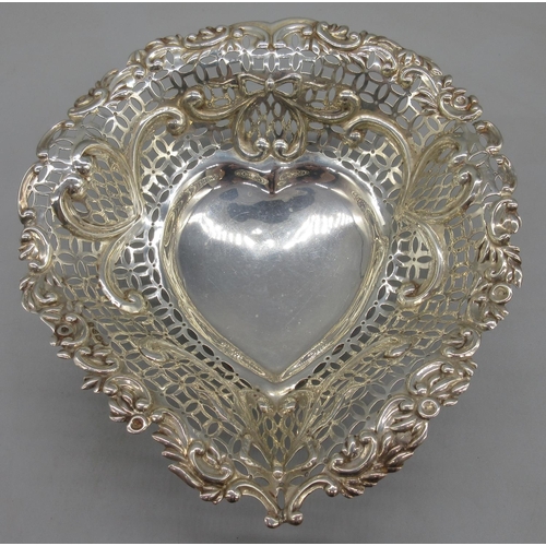 1065 - Victorian silver pierced heart shaped dish decorated with bows, hearts and swags, Chester, 1895, 6.4... 