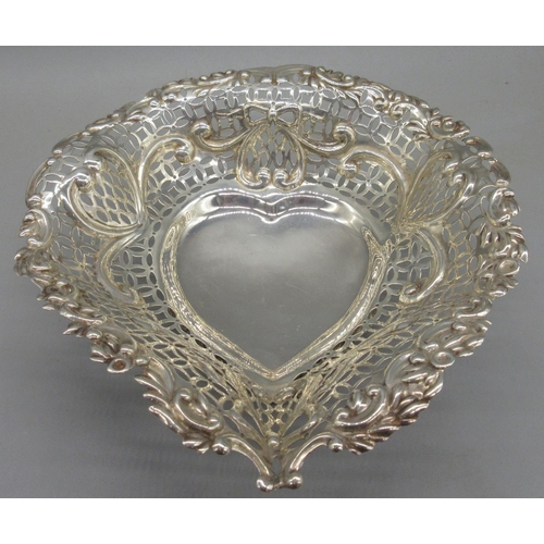 1065 - Victorian silver pierced heart shaped dish decorated with bows, hearts and swags, Chester, 1895, 6.4... 