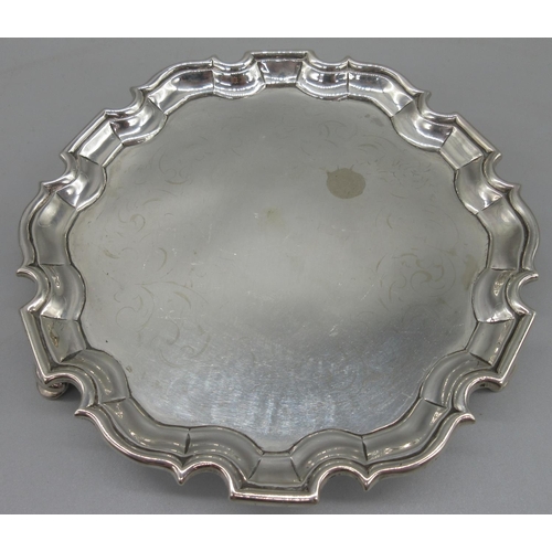 1034 - George II silver circular card tray, raised pie crust border on three hoof feet by Joseph Sanders, L... 