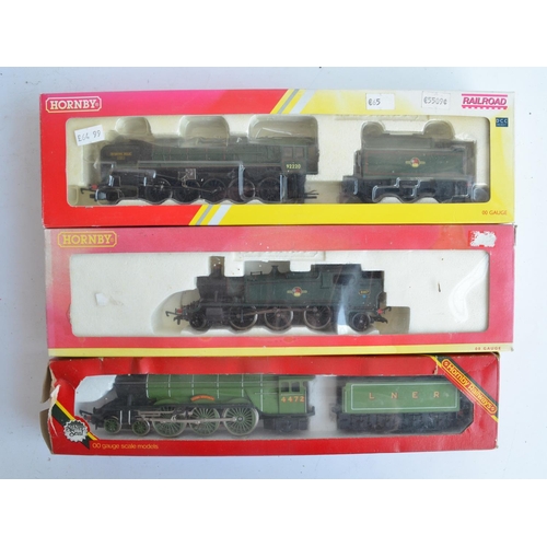 1115 - Three boxed OO gauge electric steam train models from Hornby to include R2785 BR green Class 9F 9222... 