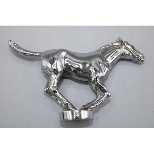 1133 - Chromed metal car bonnet mascot, Newmarket small without jockey, on circular base, stamped Lejeune M... 