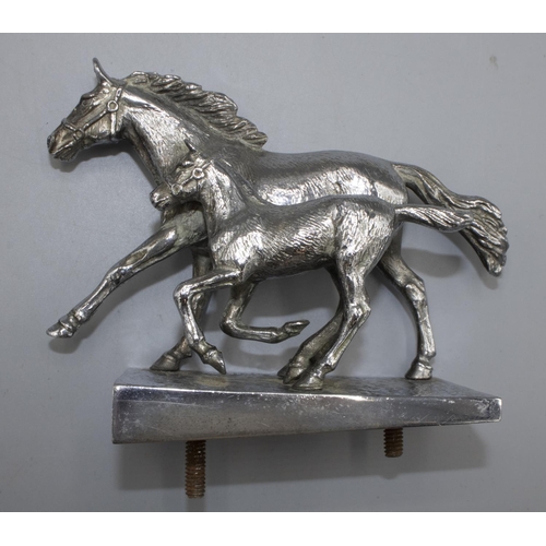 1139 - Chromed metal car bonnet mascot, modelled as a Mare and Foal, on rectangular base stamped, A E L, H1... 