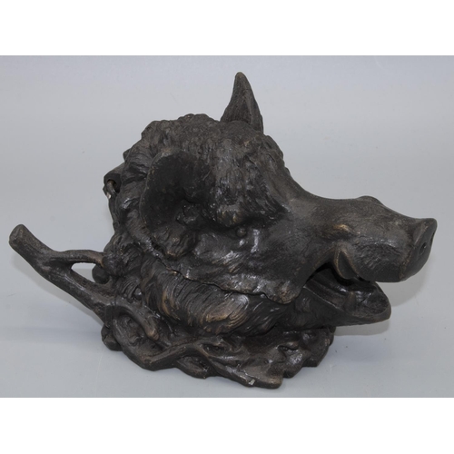 1093 - After Barrie - a patinated cast metal inkwell in the form of a boars head, with hinged jaw and natur... 