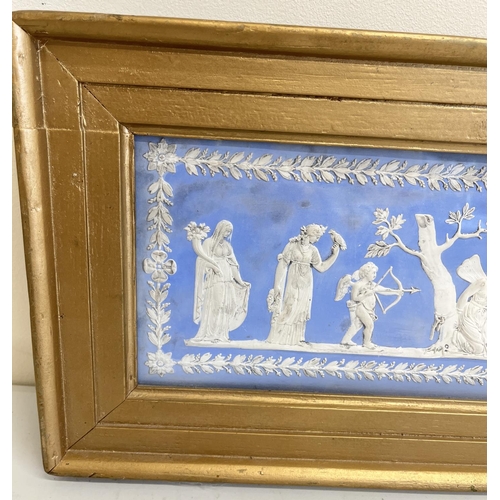 1097 - Wedgwood blue Jasper dip type fire surround tablet, decorated with figures by a brazier in a repeati... 