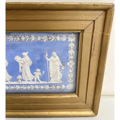 1097 - Wedgwood blue Jasper dip type fire surround tablet, decorated with figures by a brazier in a repeati... 