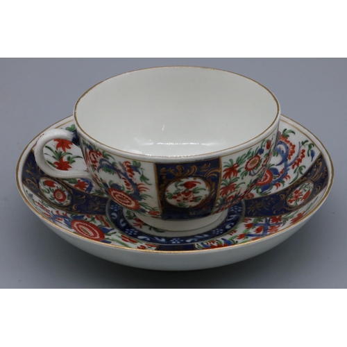 1225 - 18th century Worcester porcelain cup and saucer, painted with chrysanthemums in Kakiemon palette on ... 