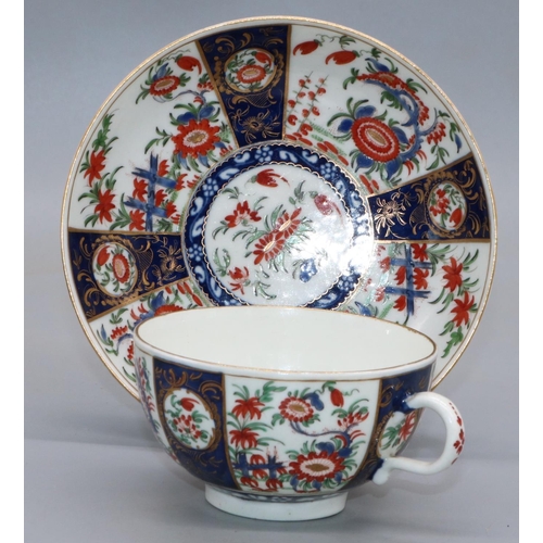 1225 - 18th century Worcester porcelain cup and saucer, painted with chrysanthemums in Kakiemon palette on ... 