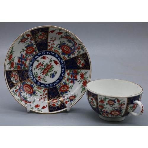 1225 - 18th century Worcester porcelain cup and saucer, painted with chrysanthemums in Kakiemon palette on ... 