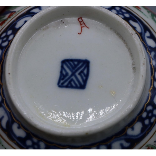 1225 - 18th century Worcester porcelain cup and saucer, painted with chrysanthemums in Kakiemon palette on ... 