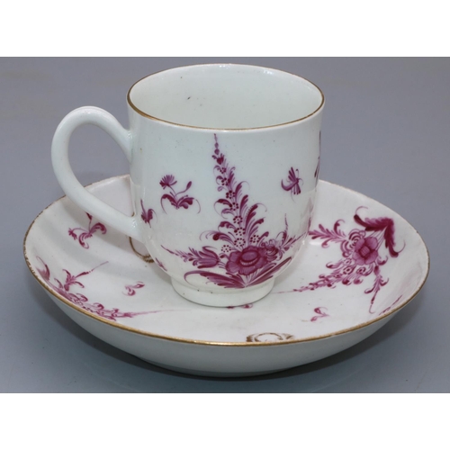 1180 - 18th century English porcelain cup and saucer, painted in with puce foliage and gilt detail, with at... 