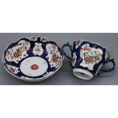 1207 - 18th century Worcester porcelain two-handled chocolate cup and saucer, painted with chrysanthemums i... 