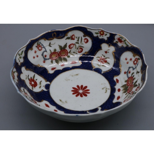 1207 - 18th century Worcester porcelain two-handled chocolate cup and saucer, painted with chrysanthemums i... 