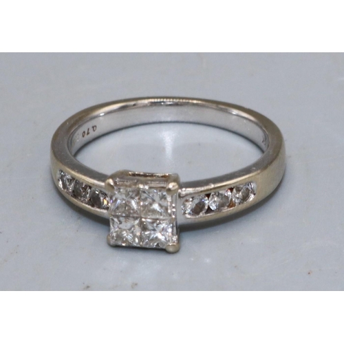 1004 - 18ct white gold ring set with four square cut diamonds in square shaped claw setting, on half diamon... 