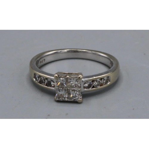 1004 - 18ct white gold ring set with four square cut diamonds in square shaped claw setting, on half diamon... 